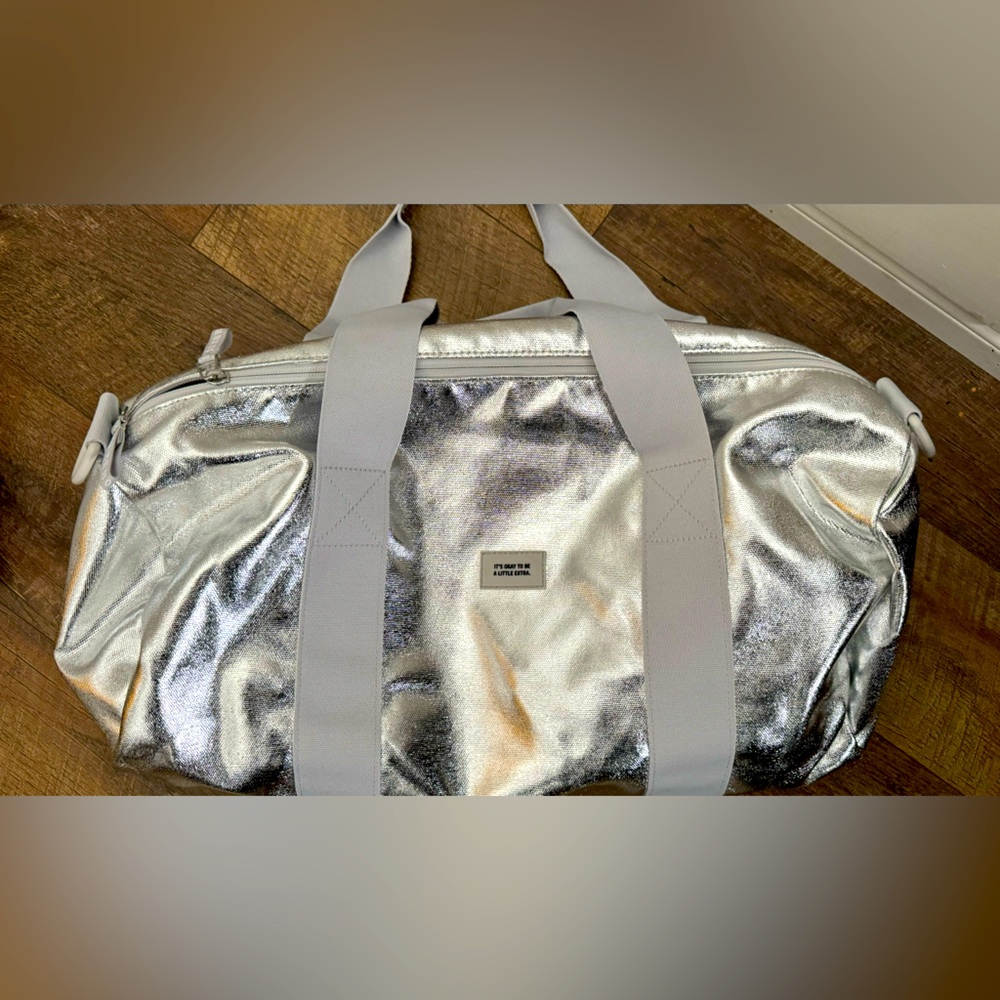 Rare Chipotle Silver Foil Duffle Bag Large, New never used.